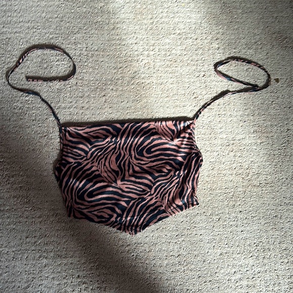 A crop top from SHEIN. Never been worn fabric is good.Zebra striped cowl shirt. - Picture 1 of 6
